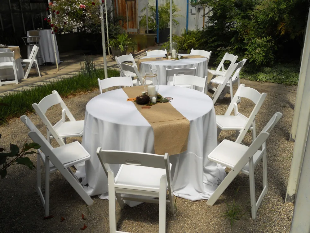 Round Tables and Resin Chairs Image